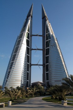 Featured is a photo of the Bahrain World Trade Center with its Giant Wind Turbines.